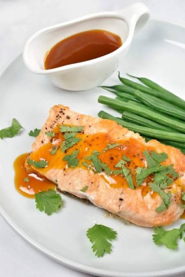 TROUT WITH PASSION-FRUIT SAUCE 2 This Brazilian-inspired fish recipe serves four people and pairs baked trout or halibut with a creamy passion-fruit sauce and vegetables such as carrots and broccoli.