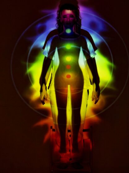 Yoga practice helps open and balance the chakras, which are energy centers in the body, by using breath, movement, and focus to let life force flow freely. 