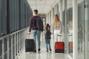 people in airport are wearing masks to protect themselves from virus